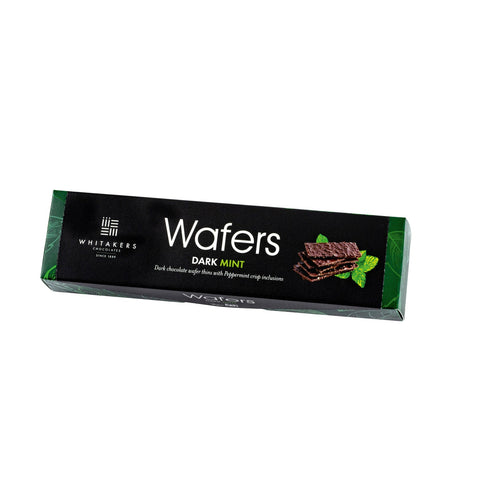 Dark chocolate covered mint wafers by Jag Couture London-New York in a carton, showcasing the crispy wafers coated in rich dark chocolate.