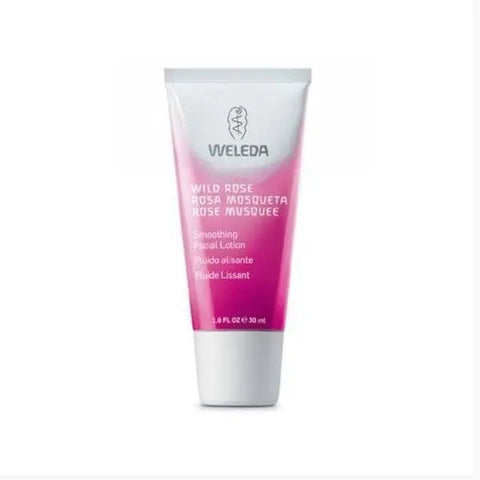 Weleda Wild Rose Smoothing Facial Lotion in 30ml bottle, featuring a pink cap and floral packaging, from Jag Couture London New York
