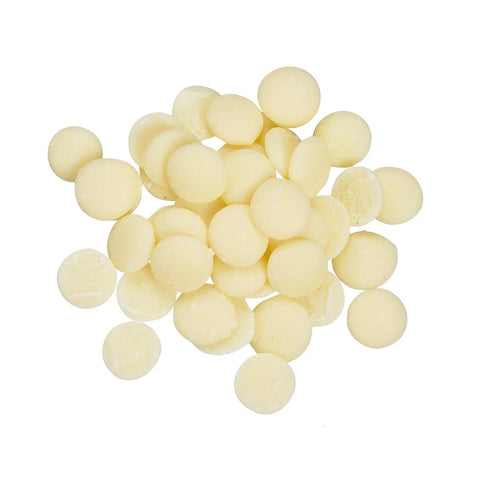 White Q2 chocolate callets from Jag Couture London and New York, shown in a close-up image of the smooth, white chocolate pieces.