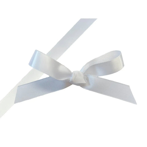 White single-faced satin ribbon by Jag Couture London - New York, showing smooth, shiny surface ideal for gift wrapping and craft projects.