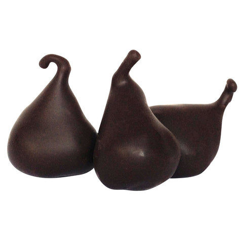 Dark chocolate enrobed figs from Jag Couture London New York, arranged on a white plate with a glossy finish.