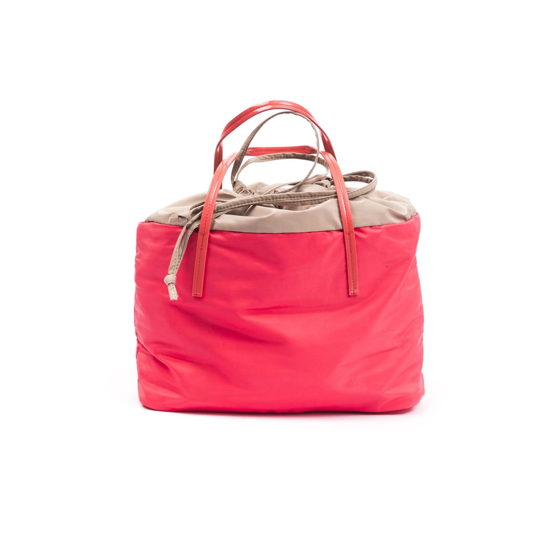 Jag Couture London byblos coral jewelry piece, featuring intricate design and vibrant coral color on a neutral background.