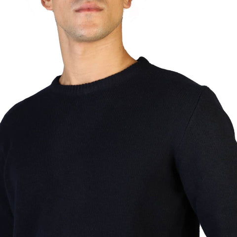Navy 100% cashmere C-neck sweater by Jag Couture London - New York, displayed flat showing soft, luxurious knit fabric.