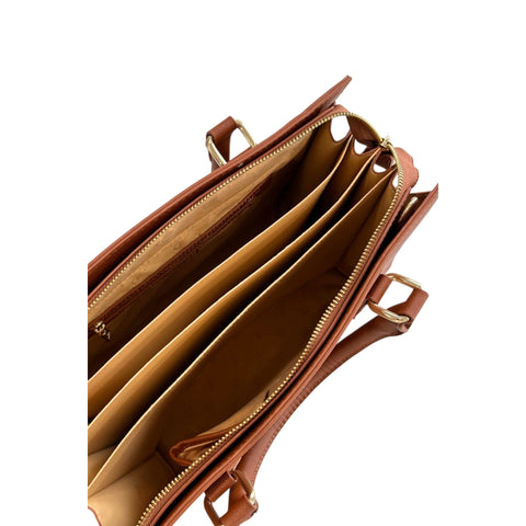 Close-up of Cristinaeffe CF24FW022_CUOIO leather handbag by Jag Couture London - New York, showcasing the textured brown leather surface.