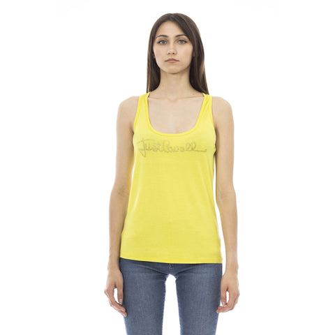 Bright lime green Just Cavalli beachwear swimsuit with bold pattern, displayed on a mannequin.