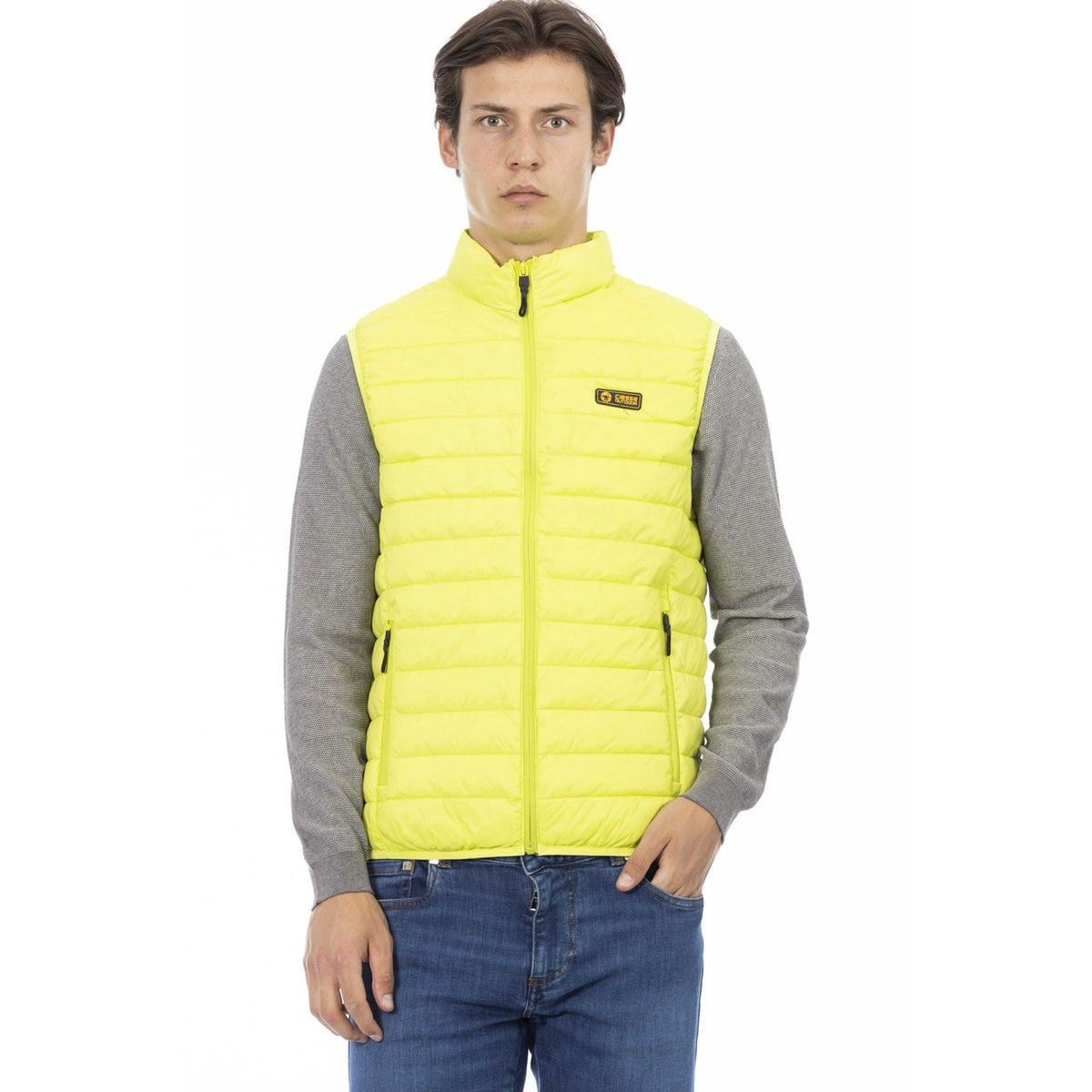 Bright yellow Ciesse Outdoor jacket by Jag Couture London - New York, displayed on a hanger with visible zipper and fabric texture.