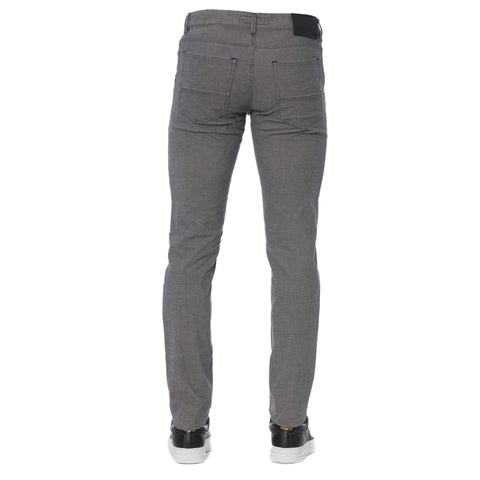 Porcelain Trussardi jeans with classic design, featuring denim fabric and detailed stitching, displayed on a neutral background.