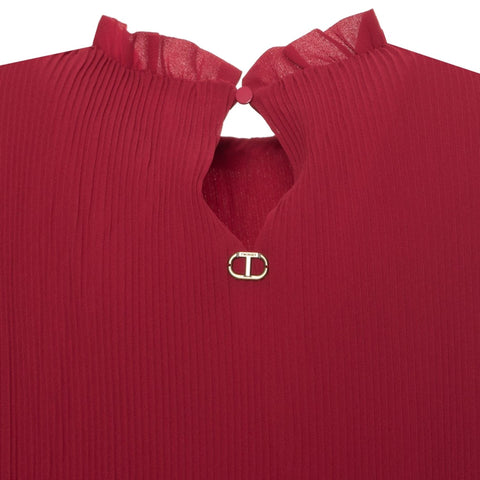 Jag Couture London - New York twinset with a stylish knit top and matching pants, featuring a modern, cozy design.