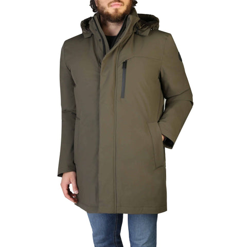 Green Woolrich Stretch Mountain jacket displayed on a hanger with visible fabric texture and branding details.