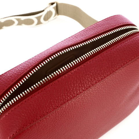 Jag Couture London New York Coccinelle X073_E5MN555M301-_R16 handbag in black leather with silver hardware, front view.
