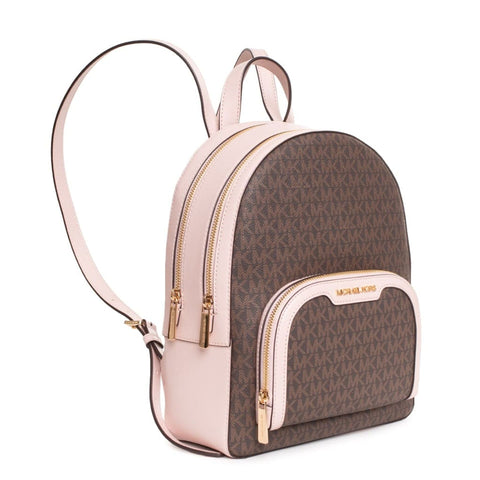 Michael Kors powder blush compact with subtle pink shade and sleek packaging, displayed with the brand logo visible.