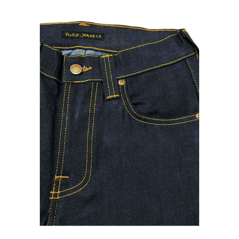 Dark blue Nudie Jeans NJ4229 tapeted denim jeans with subtle stitching details, displayed on a hanger against a neutral background.