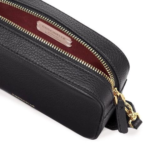Jag Couture London New York Coccinelle handbag with black leather and silver hardware, showing the front view.