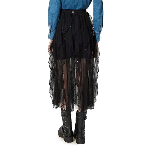 Jag Couture London-New York Twinset X073_222TT2025-_00006 featuring a stylish, detailed knit sweater with intricate patterns.