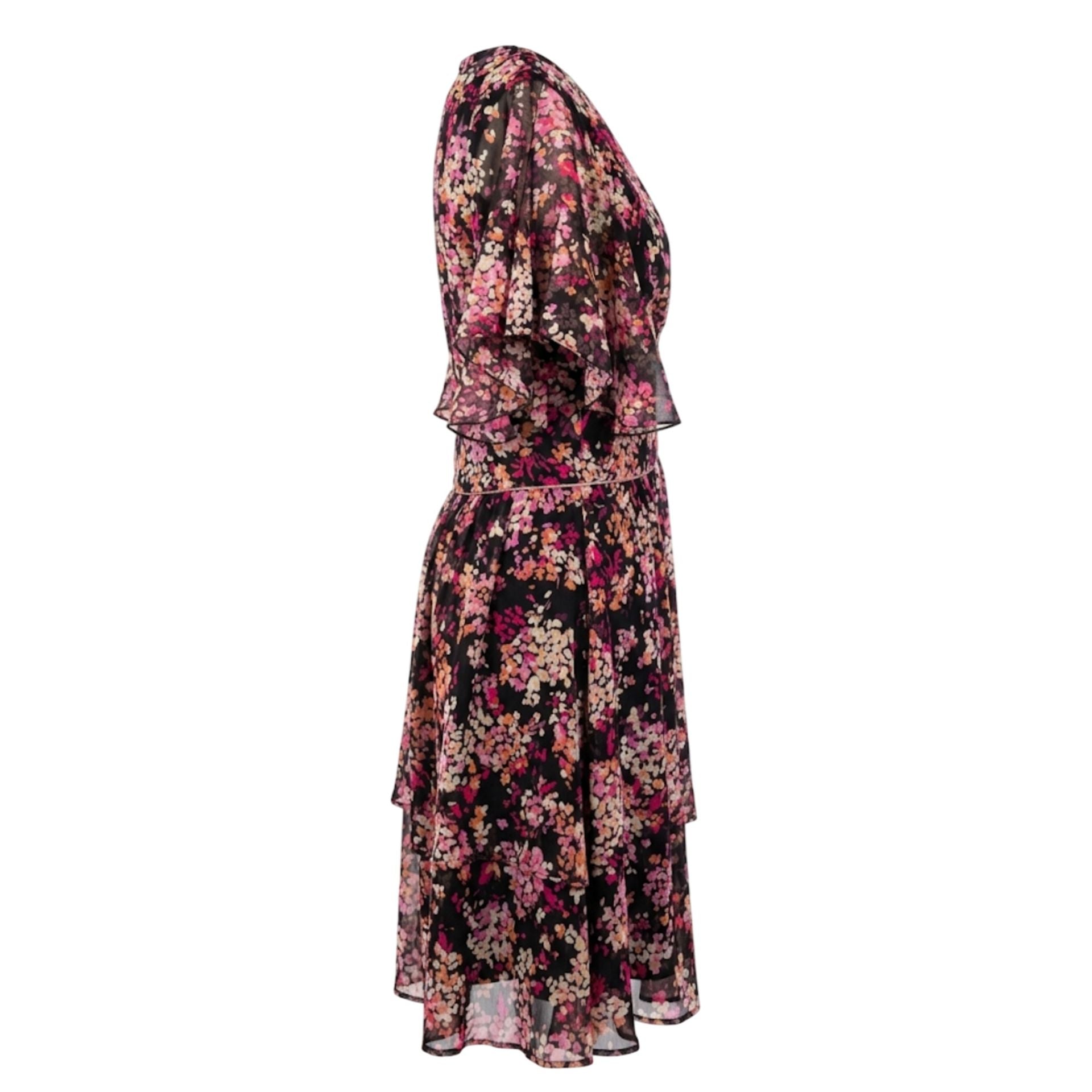 Black Trussardi jeans with floral design, slim fit, showcasing the stylish fabric and detailed embroidery on a model.