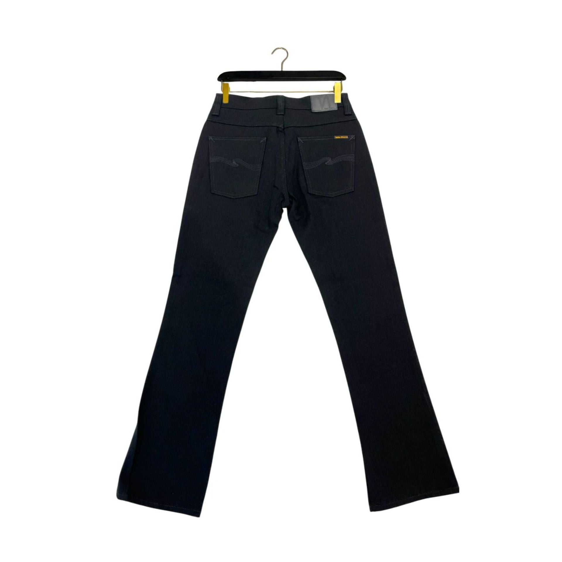 Black Nudie Jeans NJ3088 SlimJim jeans displayed on a model, showcasing a slim fit and classic denim style.
