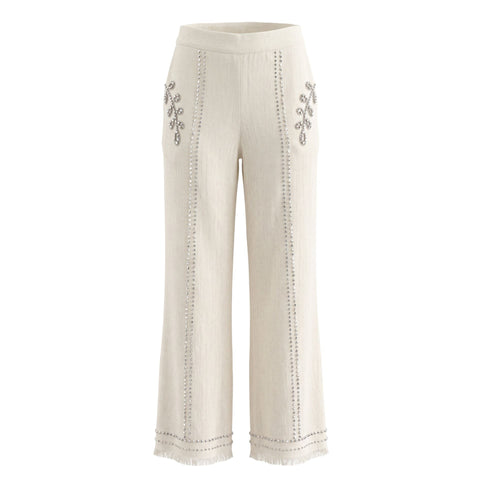 White Trussardi jeans with classic design, featuring detailed stitching and a stylish fit, showcased by Jag Couture London - New York.