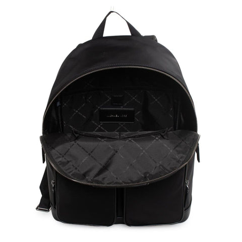 Black Michael Kors X073_37F4LKNB7B-_ handbag by Jag Couture London - New York, showing textured leather and gold-tone hardware.