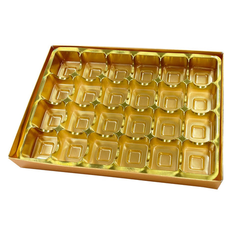 Gold chocolate base with vacuum tray and cello lid from Jag Couture London New York, showcasing elegant packaging.
