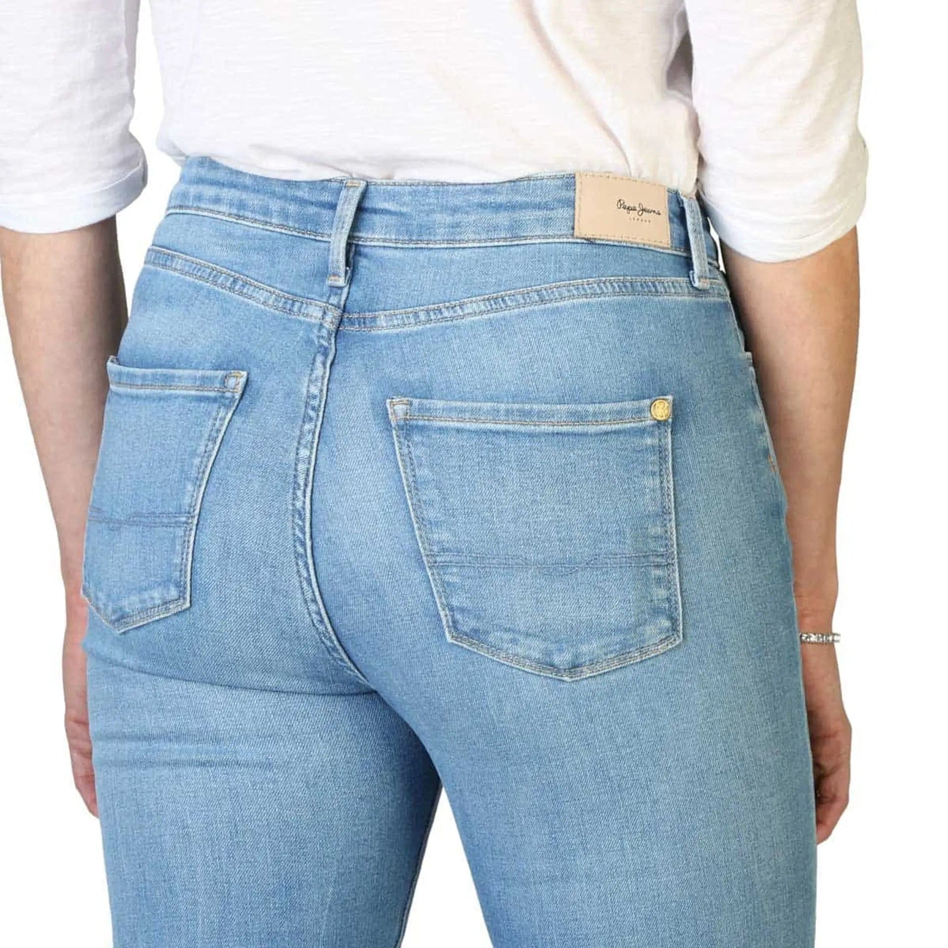 Pepe Jeans Dion flare jeans in blue denim with a high waist and flared leg, displayed by Jag Couture London - New York.