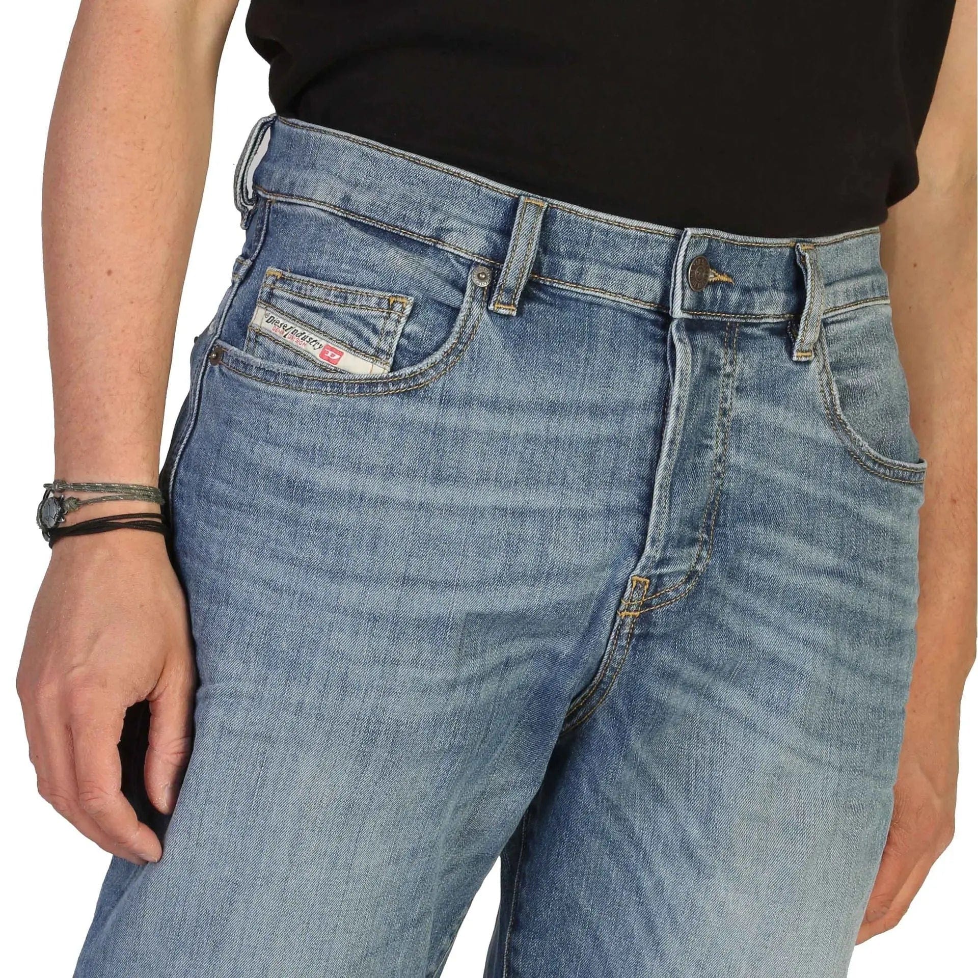 Diesel D-VIKER jeans from Jag Couture London New York, showing a close-up of the waistband and distressed denim fabric.