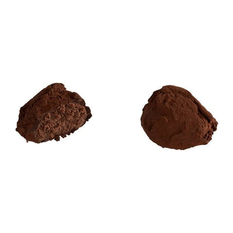 Jag Couture London dark cacao dusted truffle with rich dark chocolate filling, 13g, showcasing a glossy chocolate exterior.