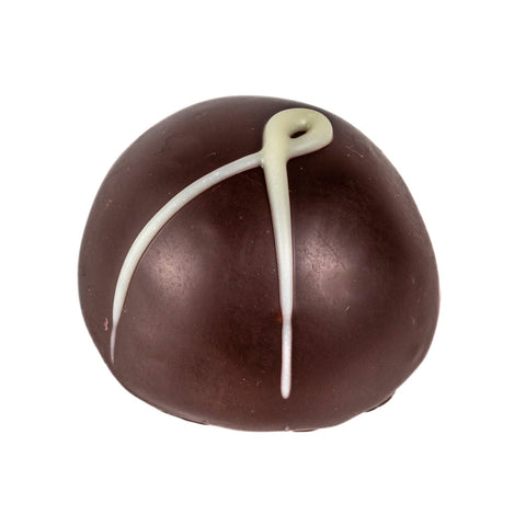 Apricot and amaretto crème fraîche in dark chocolate by Jag Couture London, 14g, displayed in elegant packaging.