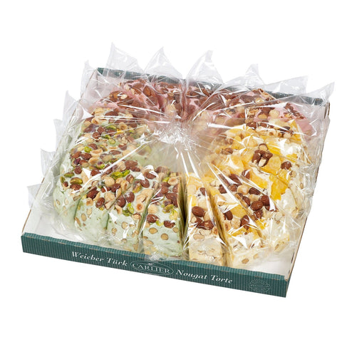 Assorted flavoured nougat cake slices including strawberry, lemon, and pistachio from Jag Couture London - New York.