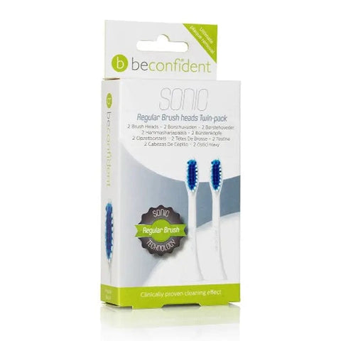 Two white Beconfident Sonic Regular Brush Heads by Jag Couture London designed for compatible electric toothbrushes.