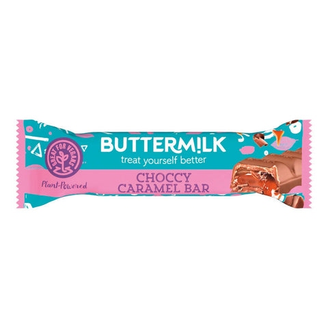 Plant-based Buttermilk chocolate segment bar by Jag Couture London with a caramel center, shown with broken pieces revealing the filling.
