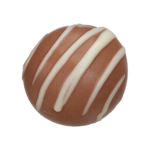 Butterscotch truffle by Jag Couture London with sea salt in smooth milk chocolate, 14g, shown in close-up with glossy finish.