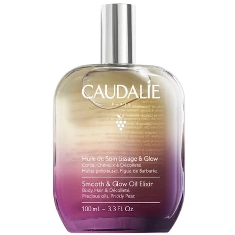 Jag Couture London New York Caudalie Smoothing and Brightening Oil 100ml bottle, clear glass with dropper cap and golden oil inside.
