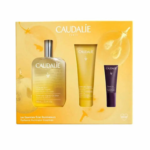 Set of three Caudalie Soleil Des Vignes Treatment Oils in 50ml bottles, featuring golden liquid and elegant packaging.
