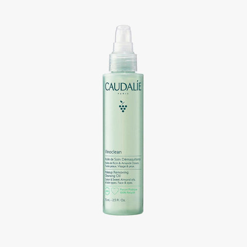 Caudalie Vinoclean Cleansing Oil in 75ml bottle, featuring clear liquid and pump dispenser, on a white background.