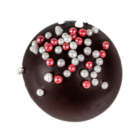 Cherry Bakewell truffle by Jag Couture London in dark chocolate with oatmilk ganache, 12.8g, shown with smooth chocolate coating.