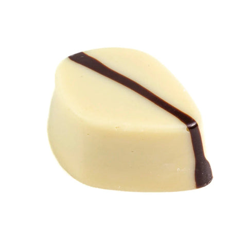 Jag Couture London Citroen lemon ganache filling in a white chocolate shell, 14.2g, showcasing the elegant confection.