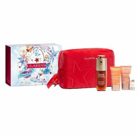 Jag Couture London - New York Clarins Double Serum 50ml set with five skincare bottles and applicator tools.