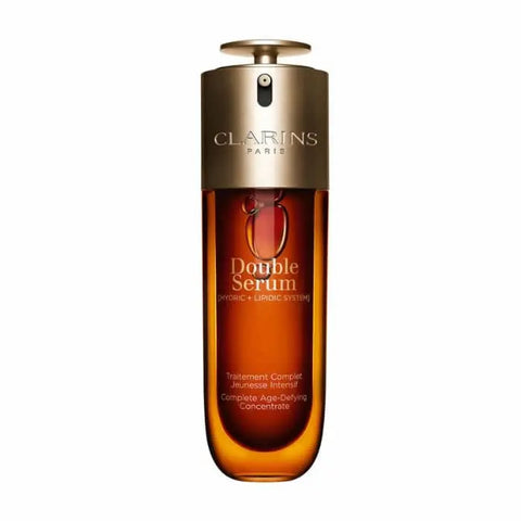 Jag Couture London New York Clarins Double Serum 75ml bottle with pump and sleek design, showcasing the skincare product.