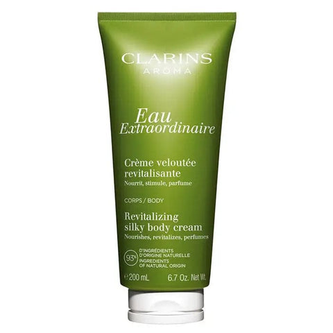 Jag Couture London New York Clarins Eau Extraordinaire Body Cream 200ml jar with smooth, luxurious cream visible inside.
