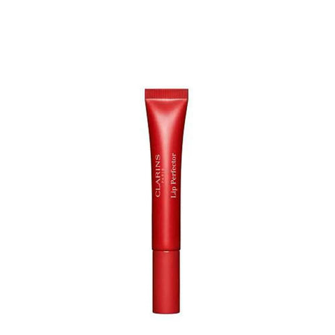 Jag Couture London New York Clarins Embellecedor Labios 23 lip gloss with shiny, smooth finish on a neutral background.