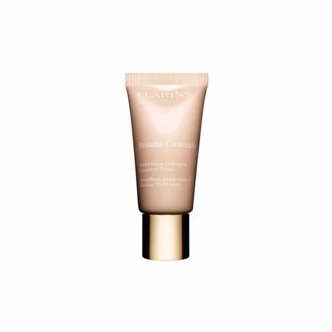 Clarins Instant Concealer Fatigue Fighting 02.5 in a 15ml tube, with applicator tip, designed to brighten and conceal tired skin.