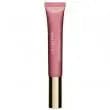 Clarins Instant Light Natural Lip Perfector 01 Rose Shimmer applied on lips with a subtle glossy finish.