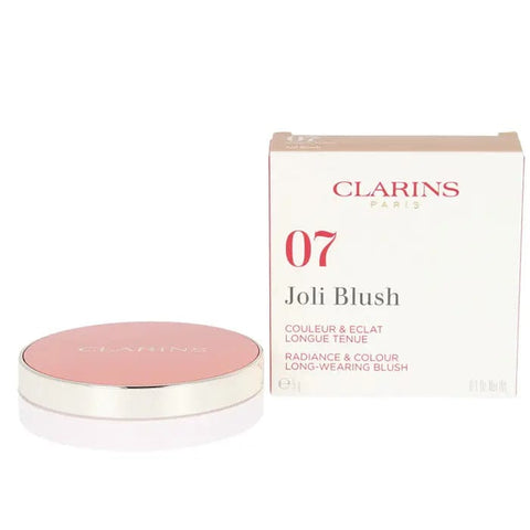 Jag Couture London New York Clarins Joli Blush 07 Cheeky Peach 5g compact with peach-colored blush and gold accents.