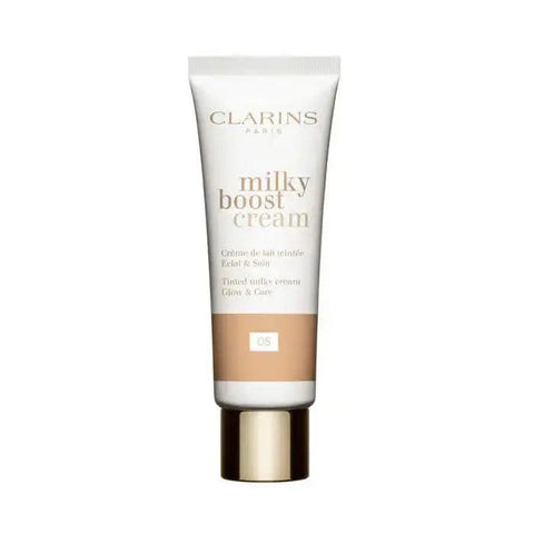 Jag Couture London New York Clarins Milky Boost Cream 05 in 45ml jar, creamy skincare product with a smooth texture and elegant packaging.