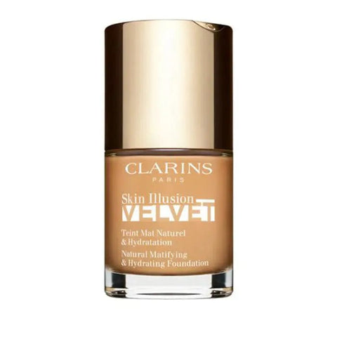 Clarins Skin Illusion Velvet Foundation in shade 112.3N, 30ml, with sleek packaging, by Jag Couture London - New York.