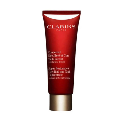 Clarins Super Restorative Décolleté and Neck Concentrate in 75ml jar, shown with the product label and applicator.