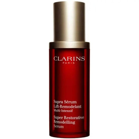 Clarins Super Restorative Remodelling Serum 30ml in a sleek bottle, designed for revitalizing and firming mature skin.