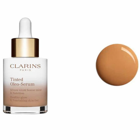 Clarins Tinted Oleo-Serum 06 in a 30ml bottle, featuring a sleek design and clear labeling, from Jag Couture London - New York.