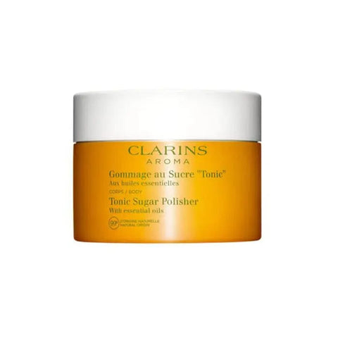 Clarins Tonic Sugar Polisher 250g from Jag Couture London New York, showing the exfoliating sugar scrub container and packaging.