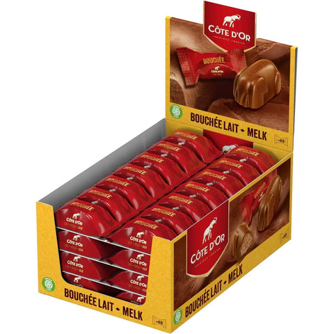 Jag Couture London milk chocolate bouchee filled with praline, displayed in a counter display.